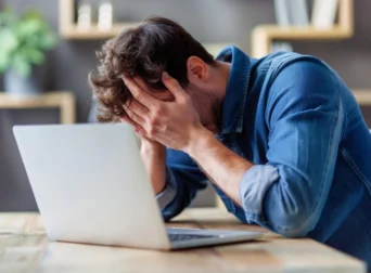 frustrated man because of award booking mistakes