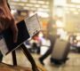 Traveler planning award flight bookings with credit cards and passport.